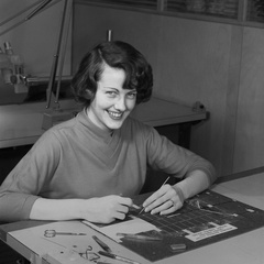 An unknown woman stringing the wiring components of the Apollo Guidance Computer memory2.